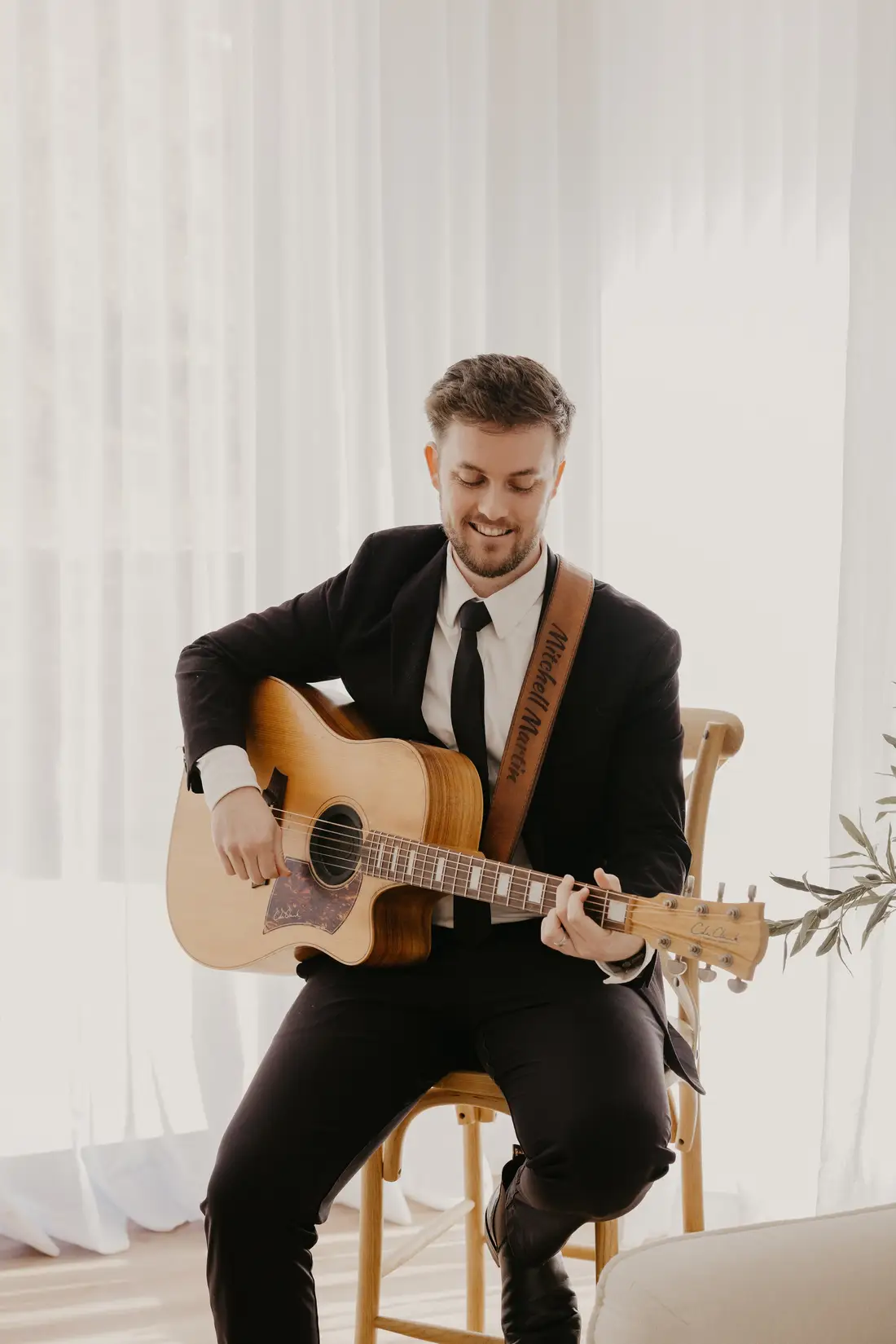 Perth wedding singer Mitchell Martin performing live acoustic guitar