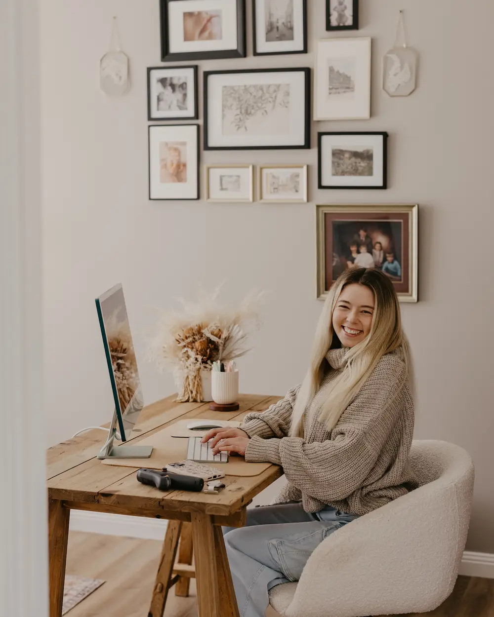 Abbey, who manages bookings and planning, working at her desk