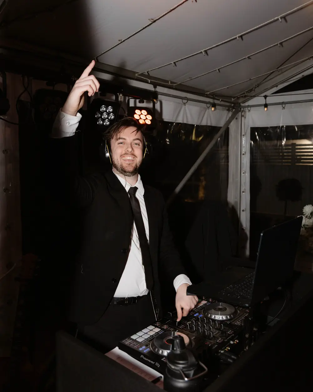 Mitchell DJing at a wedding reception